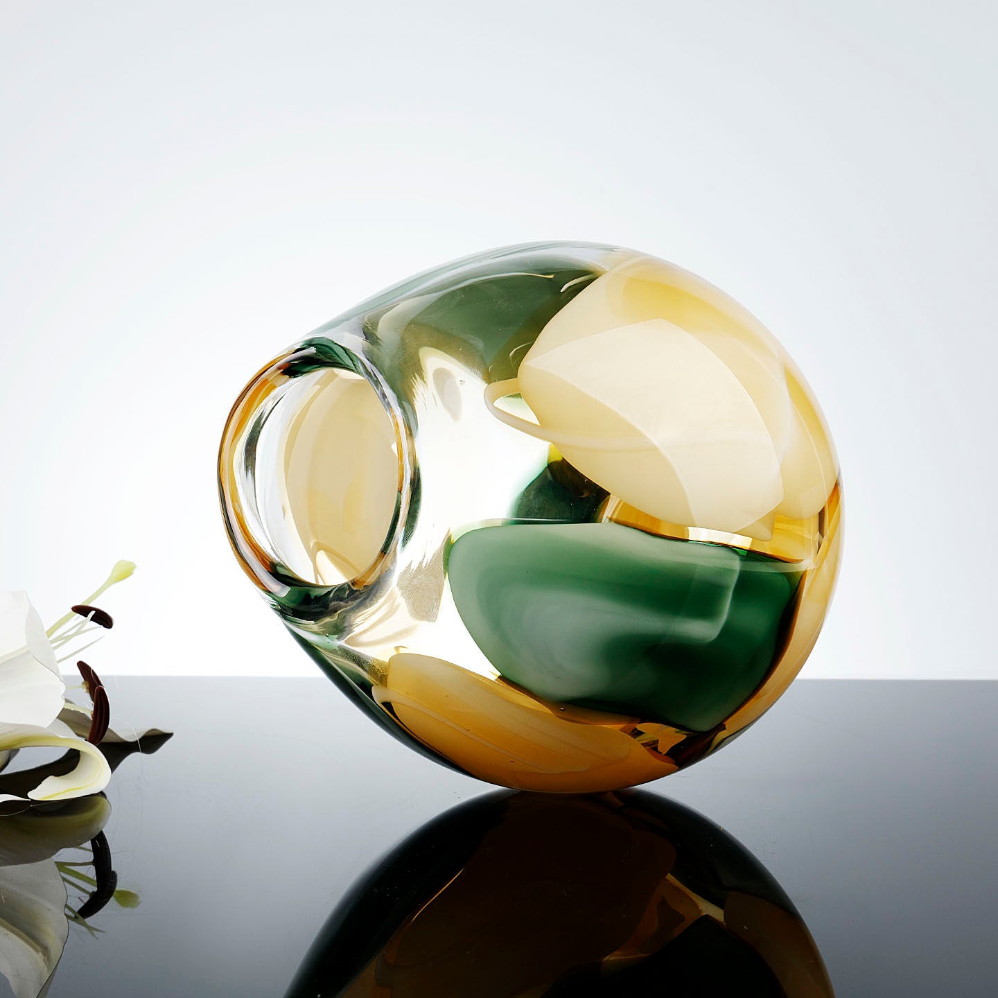 Side angled view of medium vase showing depth of glass