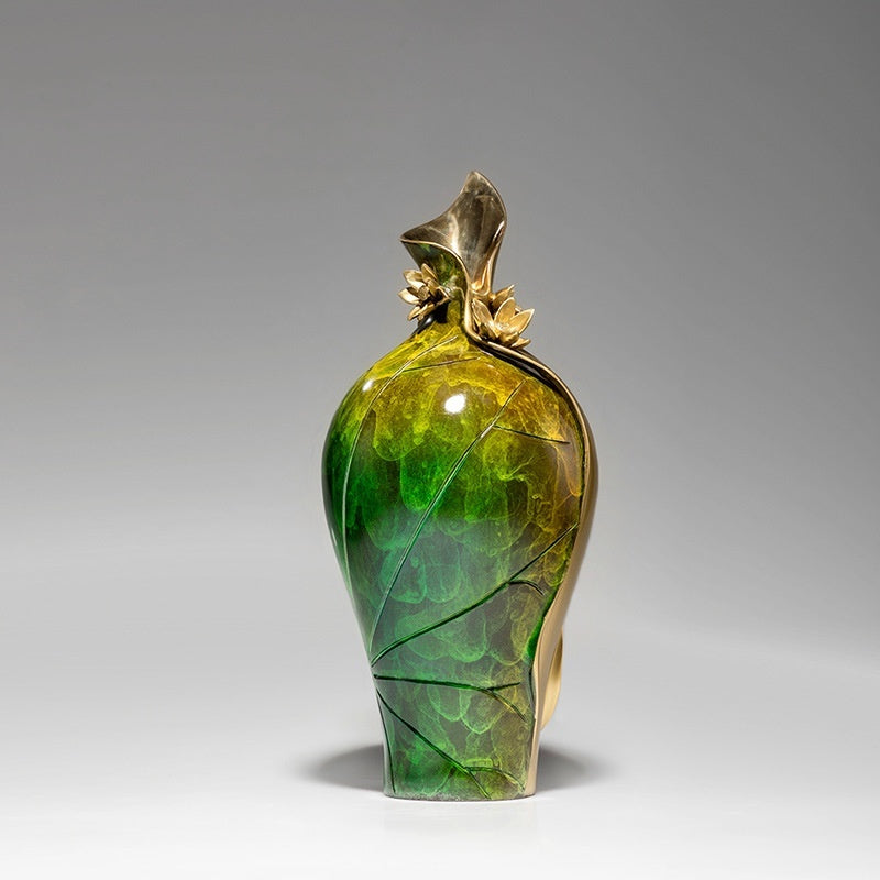 Medium green and gold vase showing textured leaf pattern