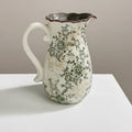 Green floral ceramic pitcher vase front view