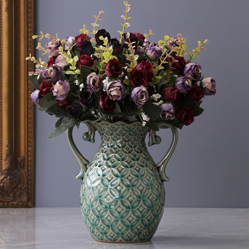 Front view of green ceramic vase with purple flowers