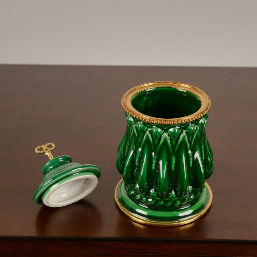 Open view of green ceramic jar showing interior and brass rim