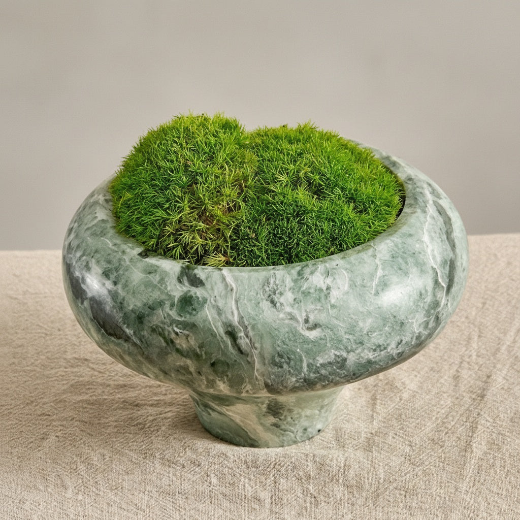 Side view of green marble stone vessel