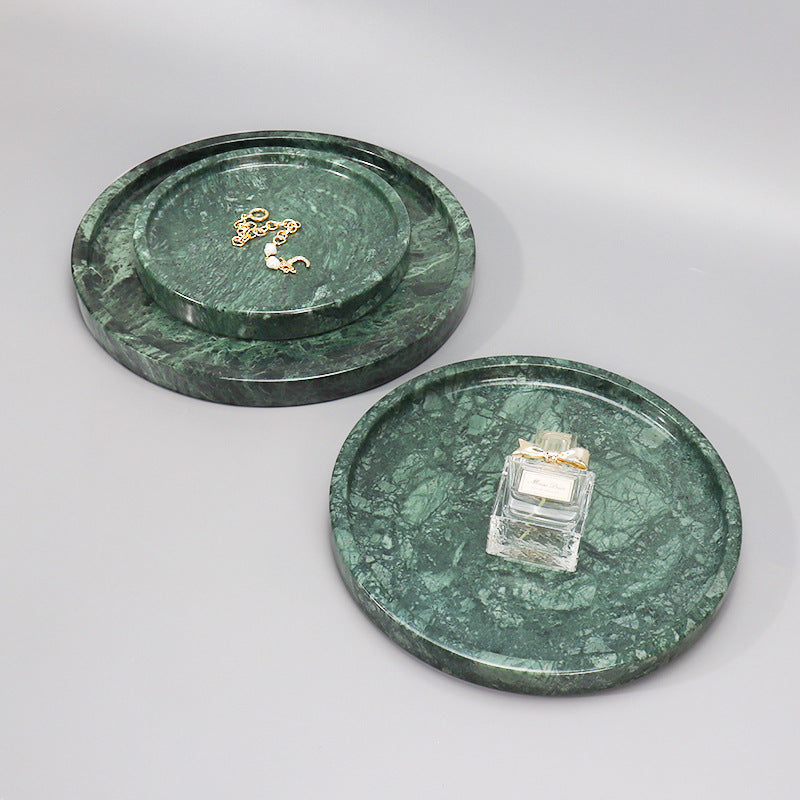 Stacked green marble round trays showing size comparison