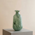 Large green swirl glass vase with ruffled rim