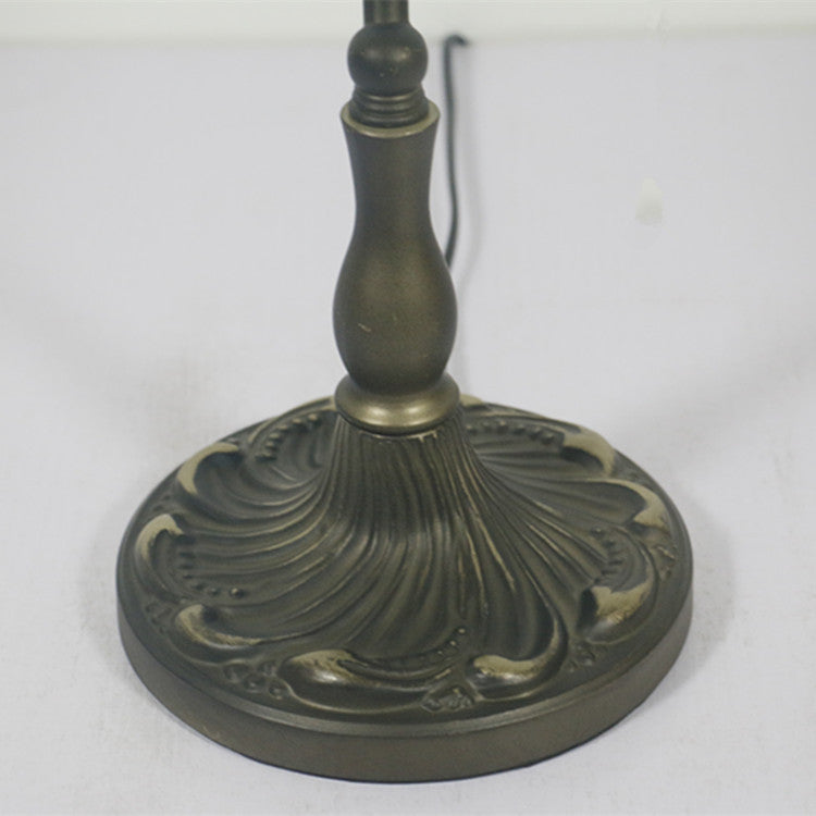 Detail of antique bronze finish lamp base