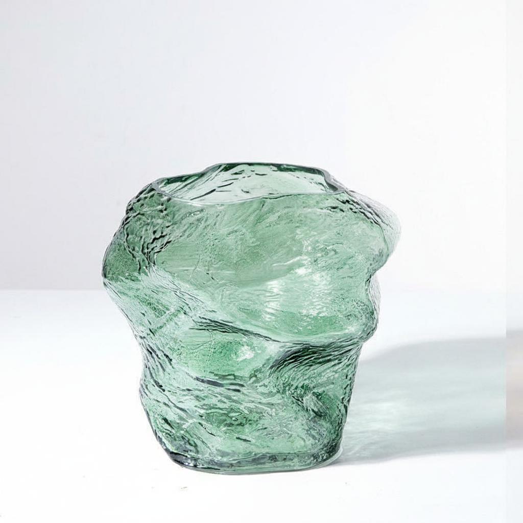 Solo shot of medium green textured glass vase