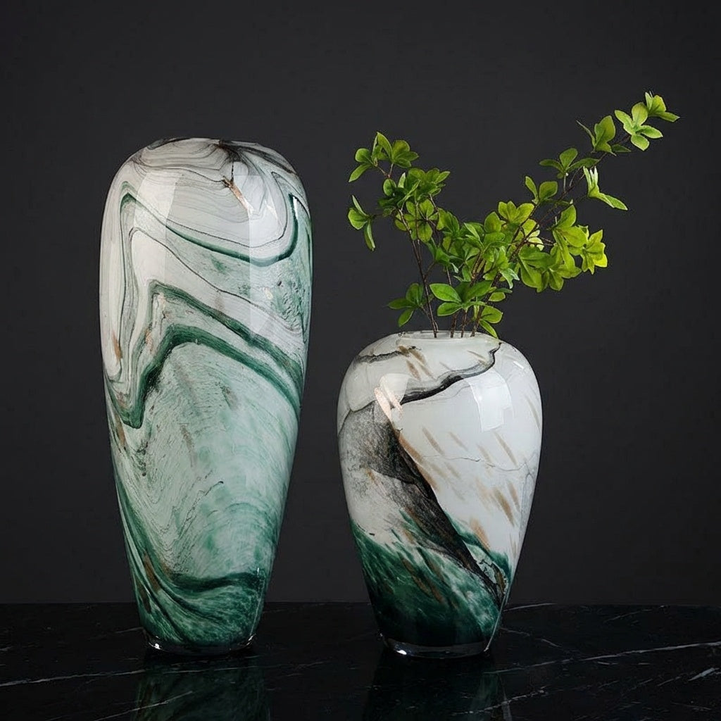Green and white art glass vase with marble swirl pattern
