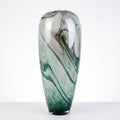 Close up of abstract landscape pattern on glass vase