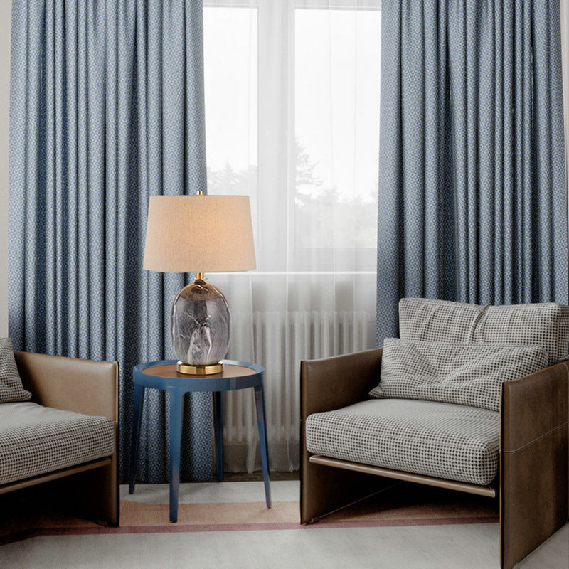 Ceramic table lamp with marble finish in living room