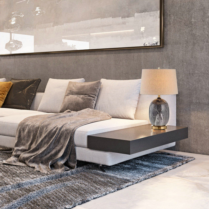 Luxury grey oval lamp on modern console table