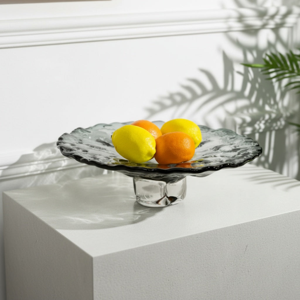 Side view of grey ripple glass centerpiece on table