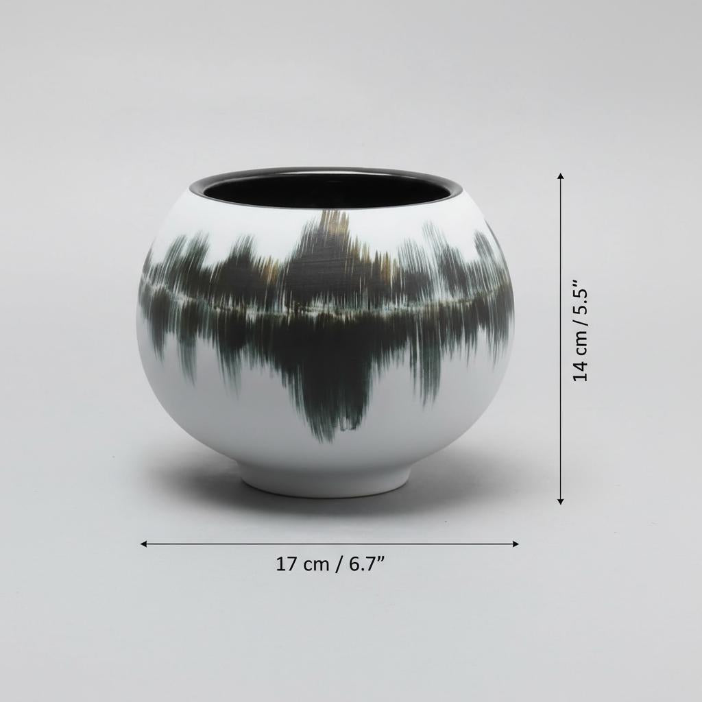 Dimensions of medium ceramic orb vase showing 17cm width and 14cm height