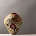 Front view of hand-painted ceramic vase with abstract surrealist design