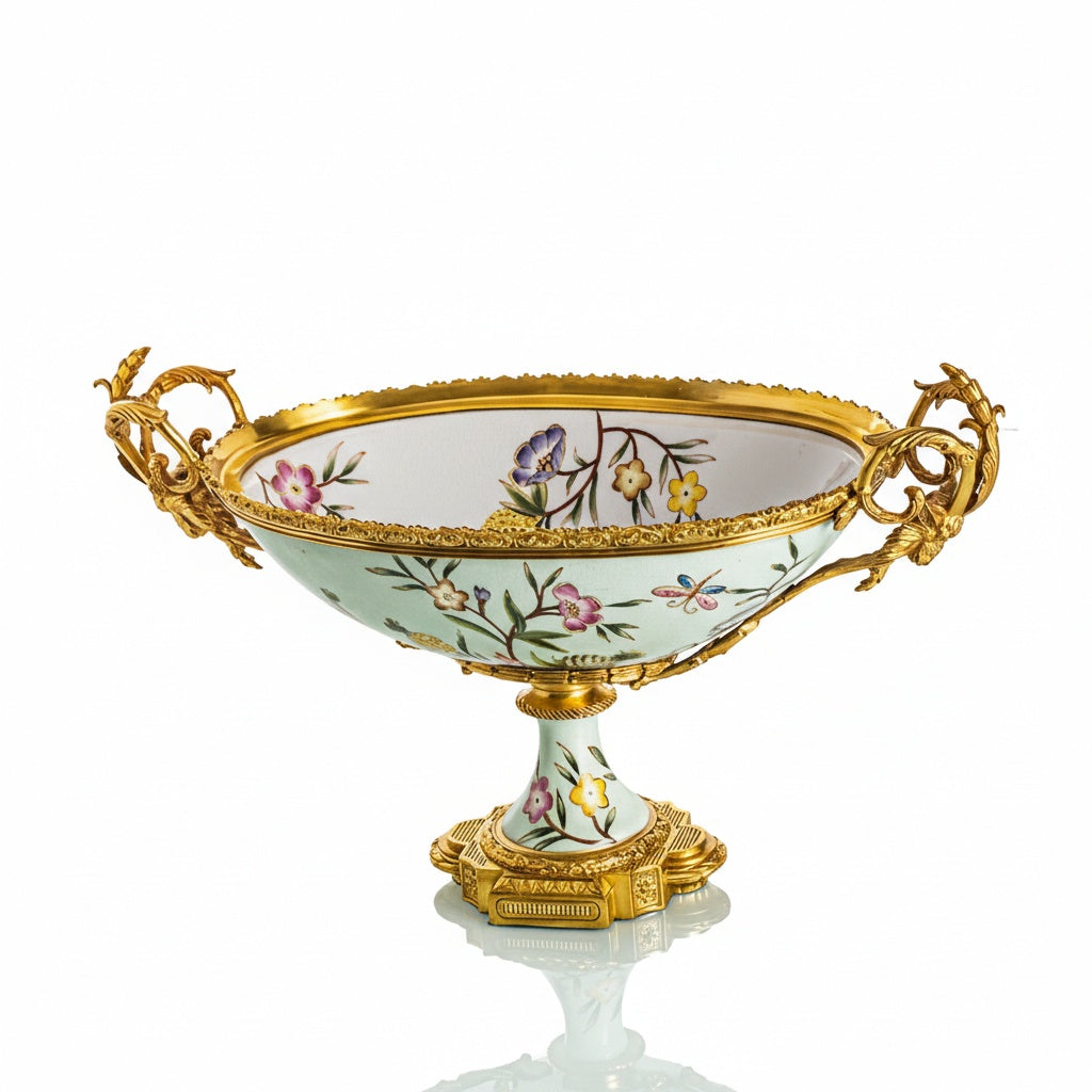 Front view of ceramic centerpiece with gilt mounts on white background