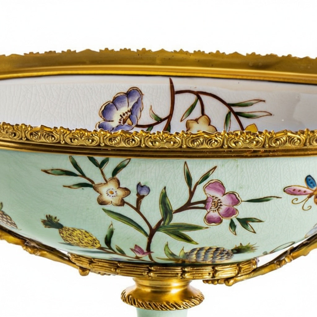 Close up of hand-painted floral and pineapple motifs on crackle glaze