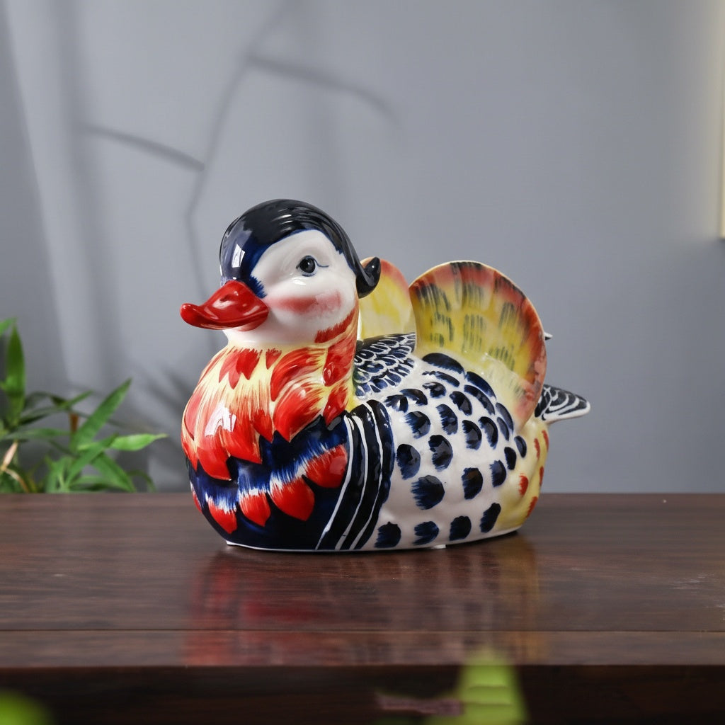 Front three-quarter view of hand-painted porcelain duck statue