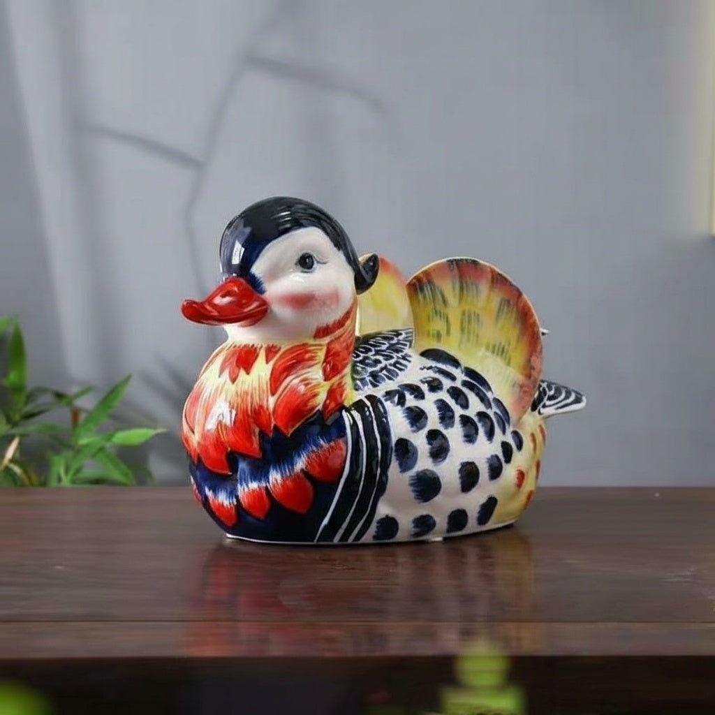 Side view of vibrant ceramic duck decor on wooden table