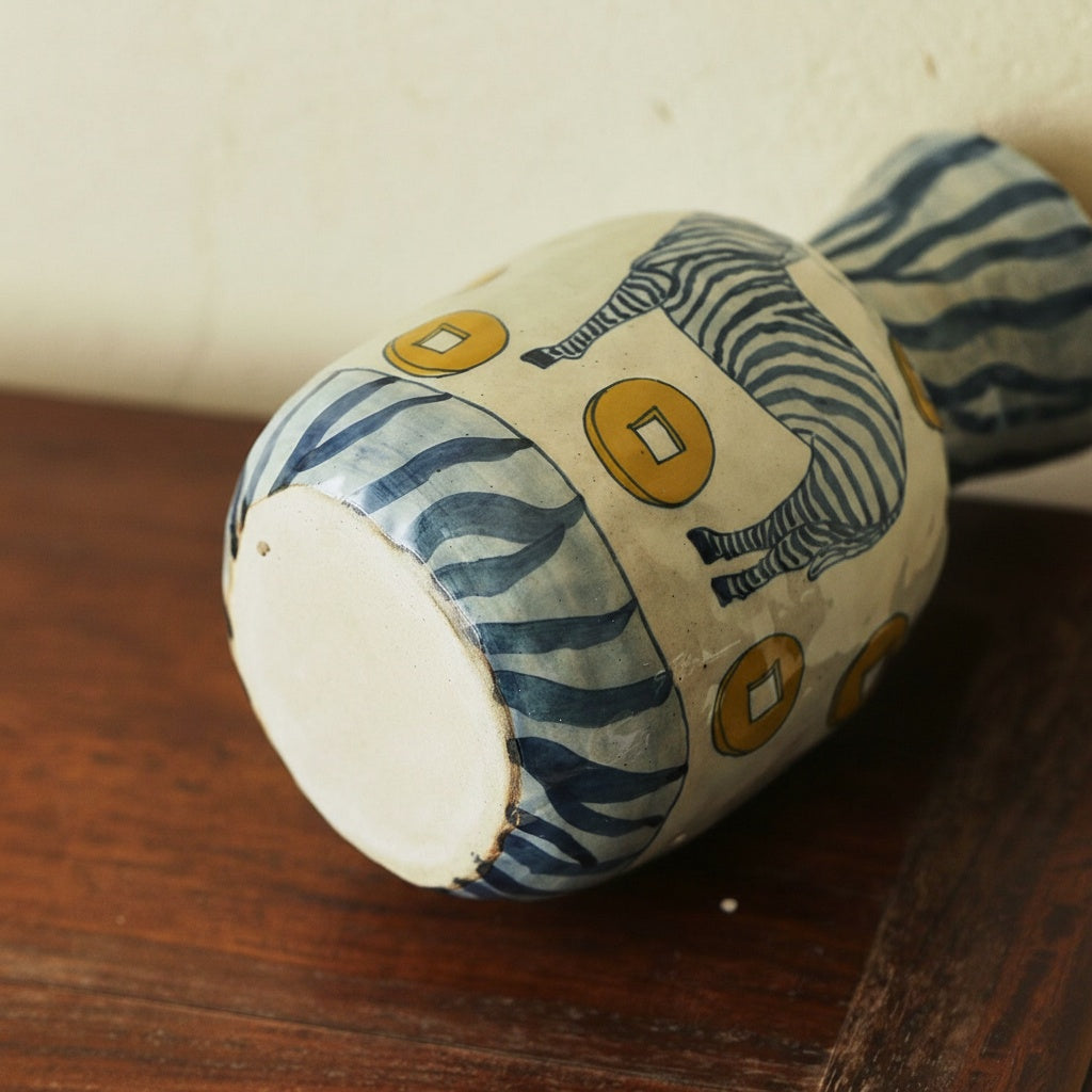 Underside view of ceramic zebra vase base