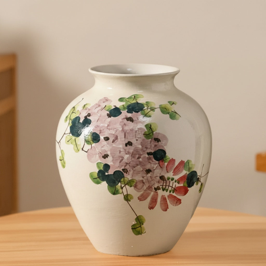 Front view of floral patterned ceramic bulbous vase