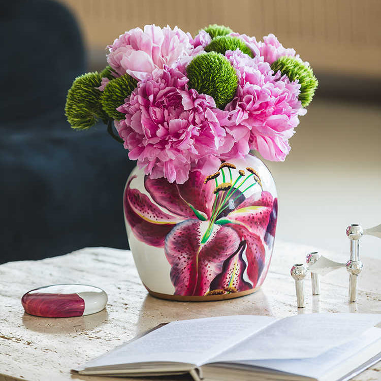 Porcelain ginger jar used as a vase with fresh flowers