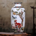 Front view of hand-painted porcelain vase featuring horse and pine tree landscape
