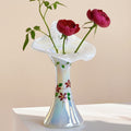 Iridescent glass vase with hand painted flowers and ruffled rim