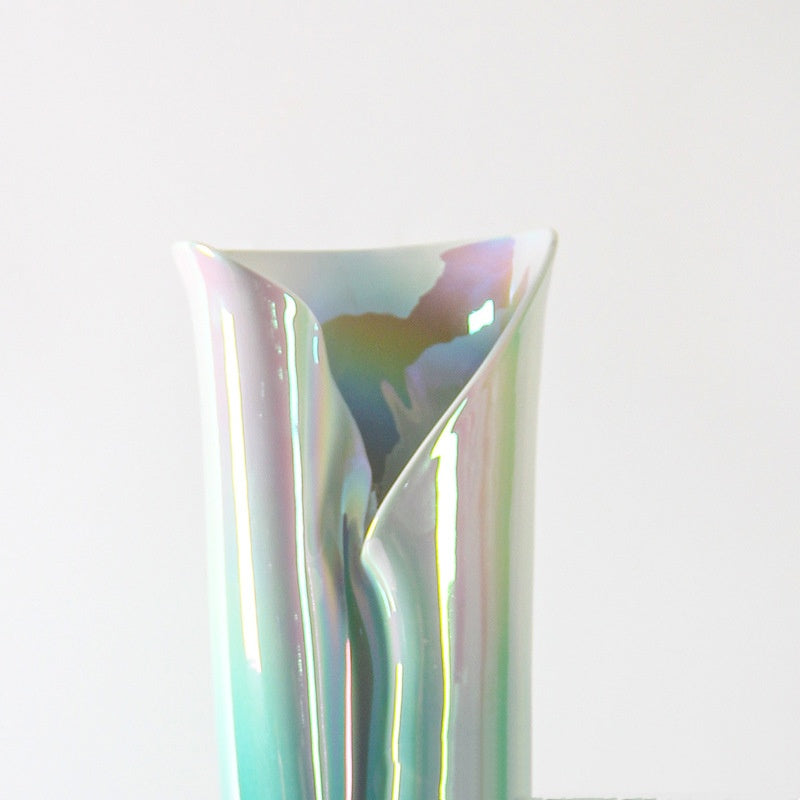 Close up detail of folded porcelain rim