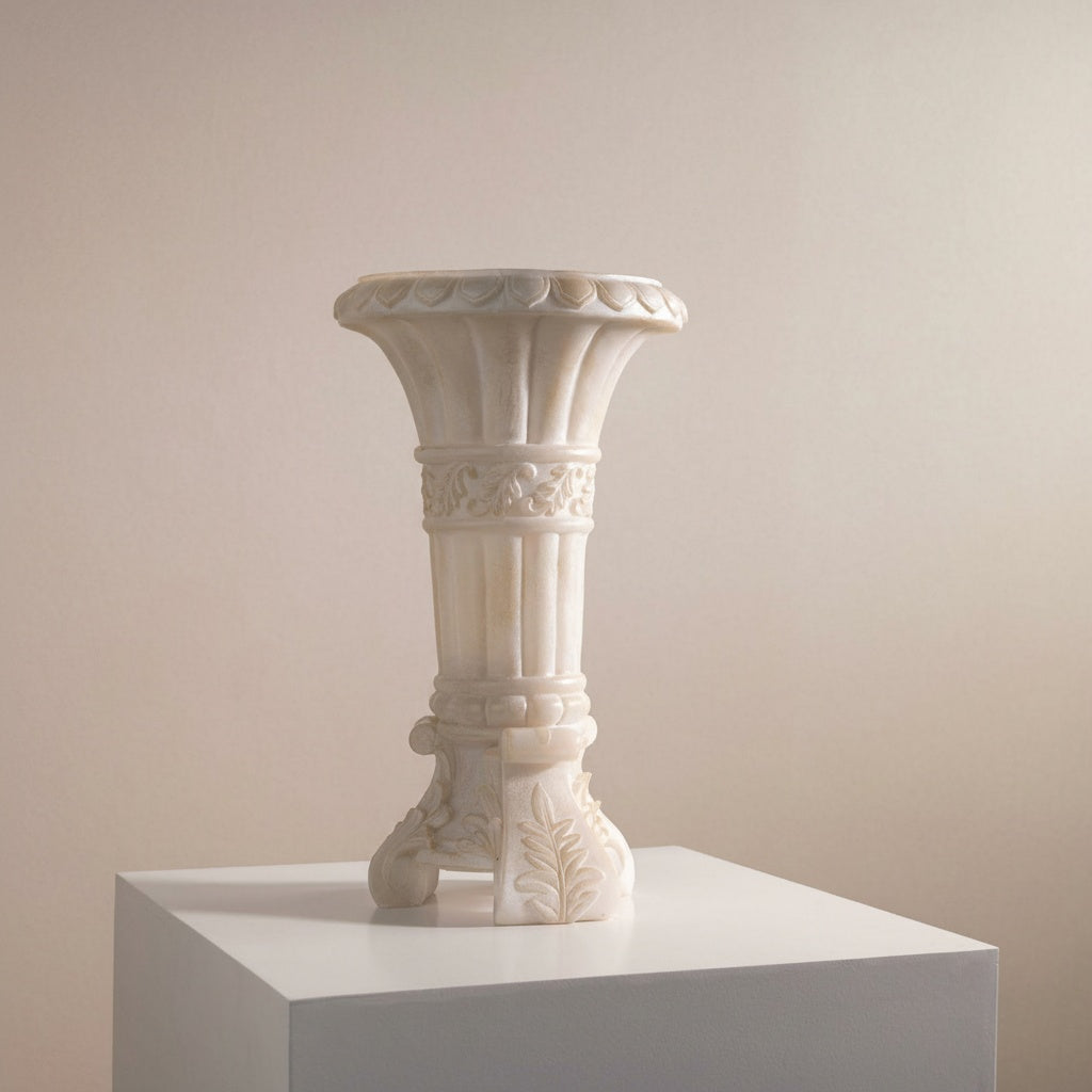 Ivory Carved Stone Pedestal Vase on display plinth