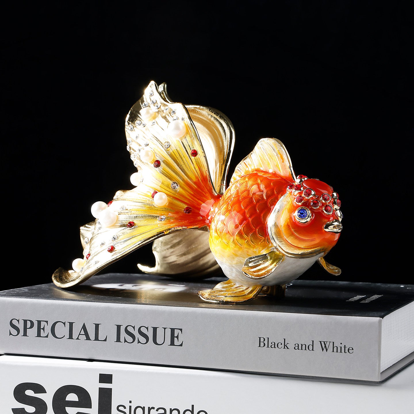 Red and gold enamel goldfish figurine front view