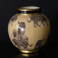 Front view of leopard print ceramic round vase with gold rim