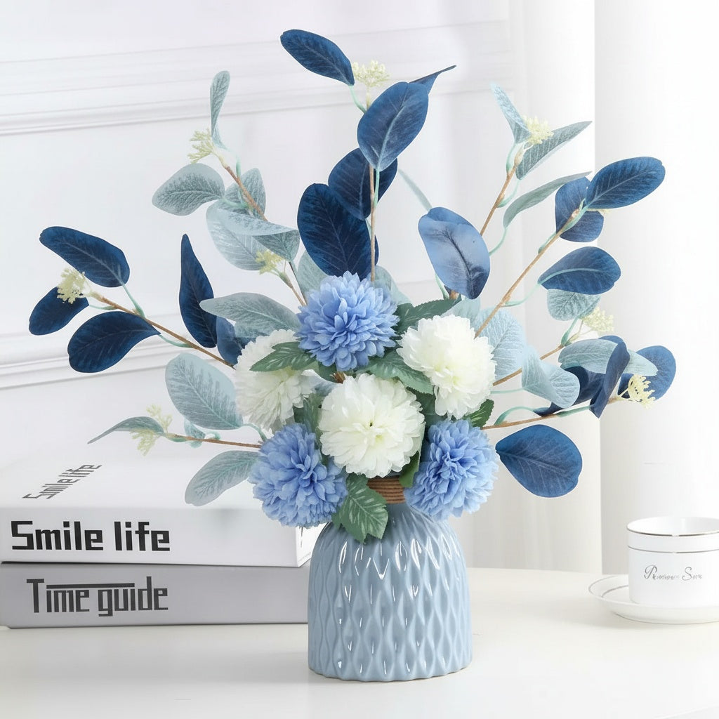 Light Blue Geometric Ceramic Vase with Floral Arrangement