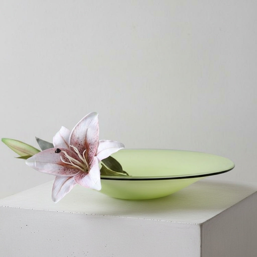 Lime green glazed glass shallow bowl with lily flower styling