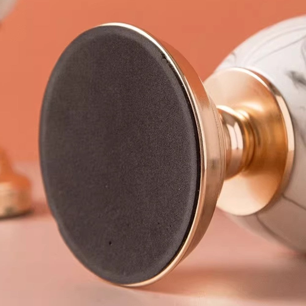 Non-slip base detail of ceramic pedestal vase with gold-tone stand