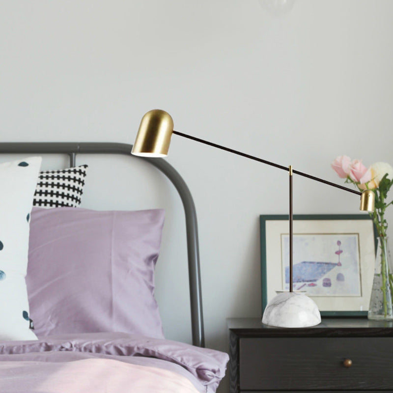Luxury brass balance lamp on bedside table