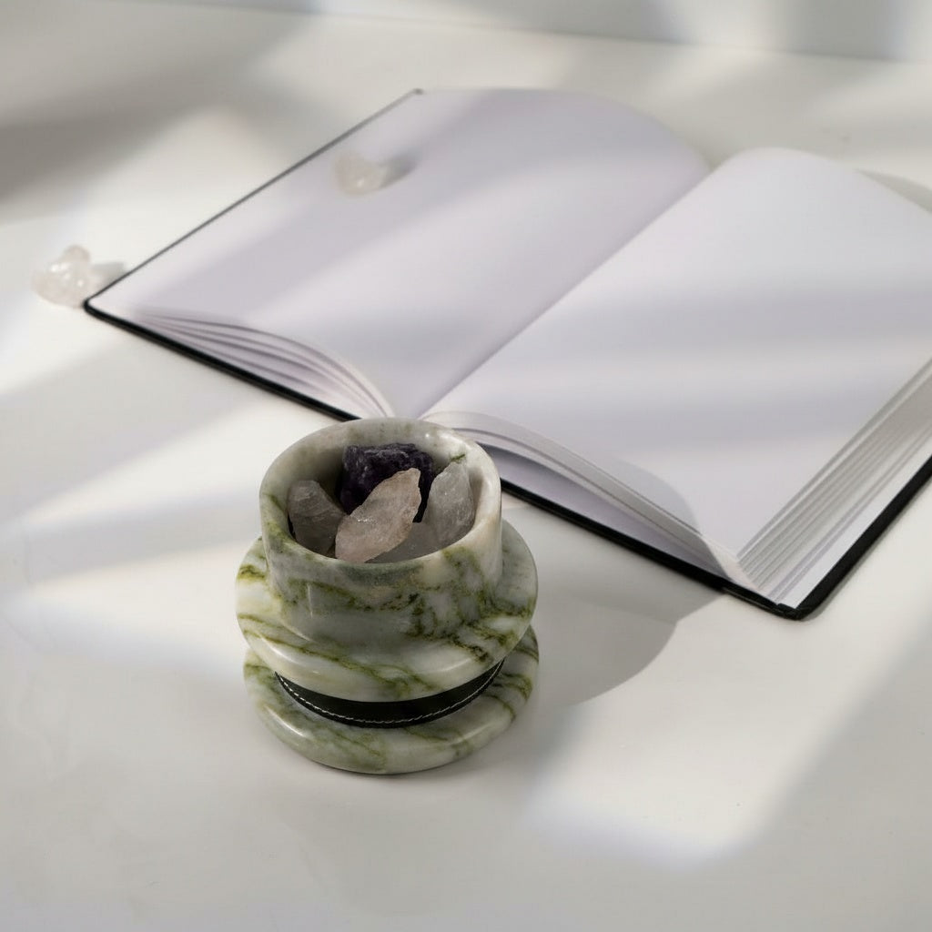 Emerald green stone crystal diffuser with black leather stitching detail