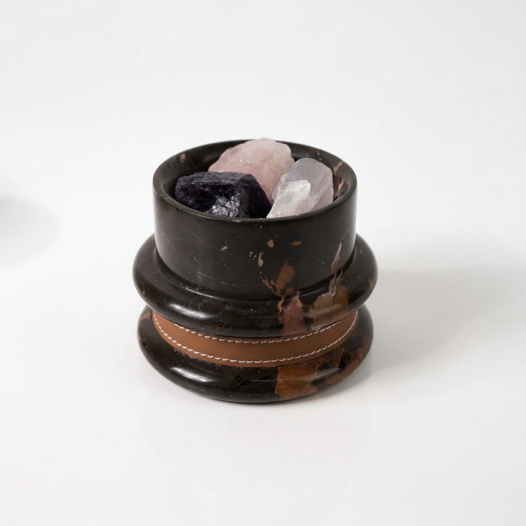 Black marble crystal diffuser with tan leather band and amethyst crystals