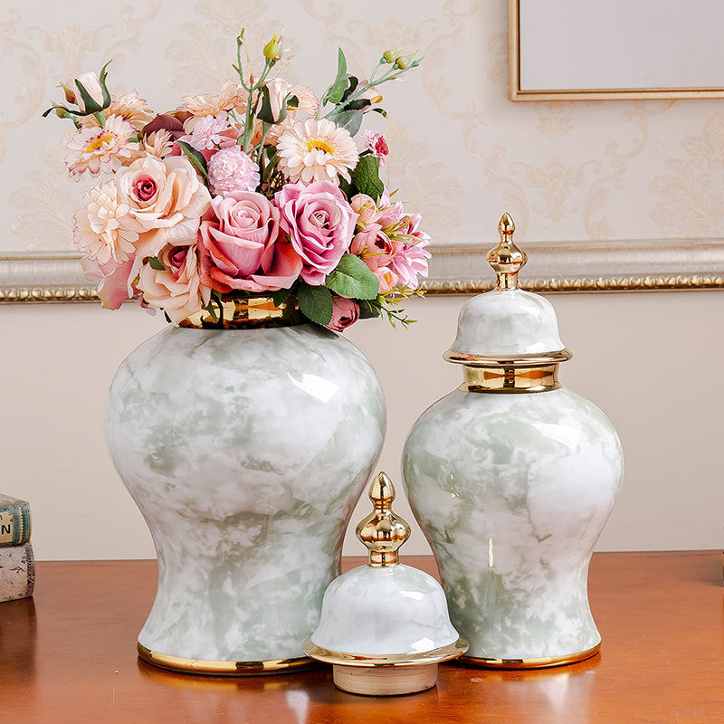 Jars displayed with floral arrangement