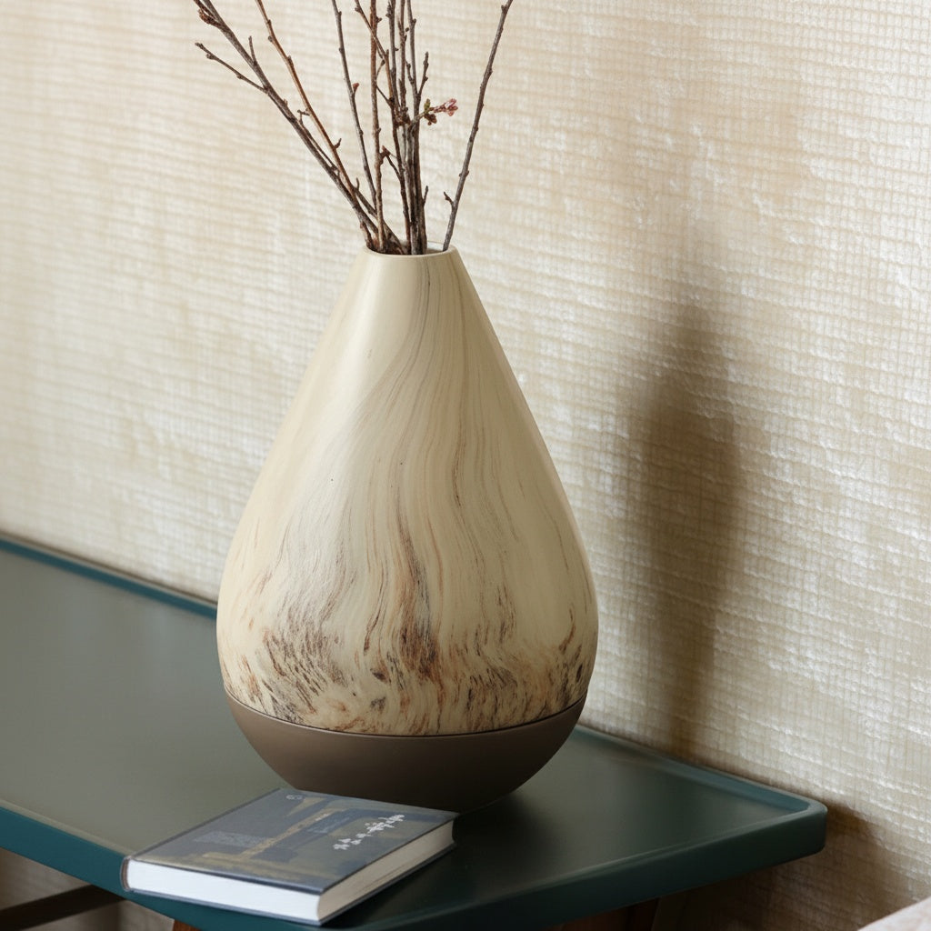 Close up of the vase on a green table showing marble swirl texture