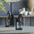Matte black sculpted horse bookends front view