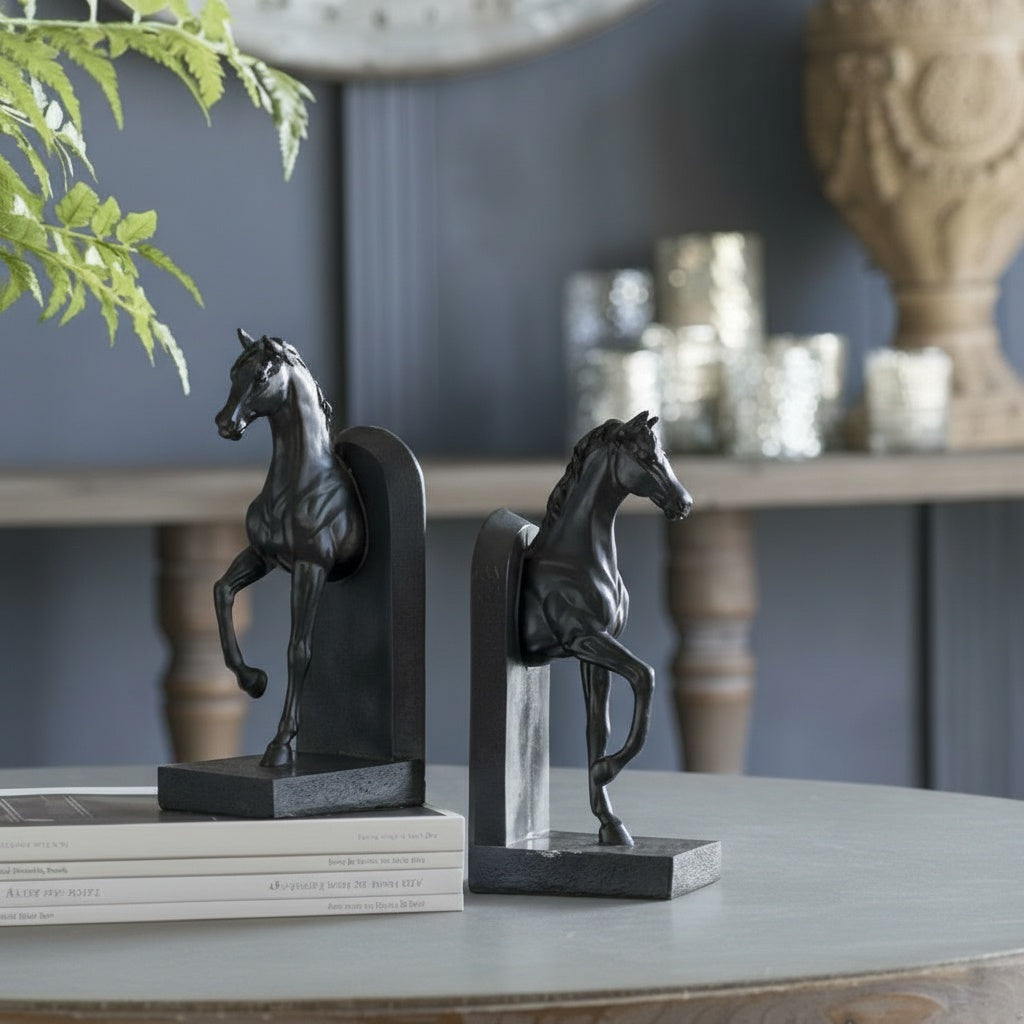 Matte black sculpted horse bookends front view