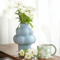Matte Blue Ceramic Sculptural Vase With Flowers