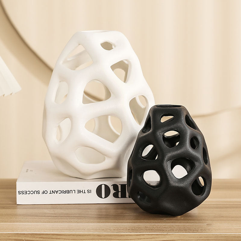 Matte ceramic abstract hollow vase in black and white group shot