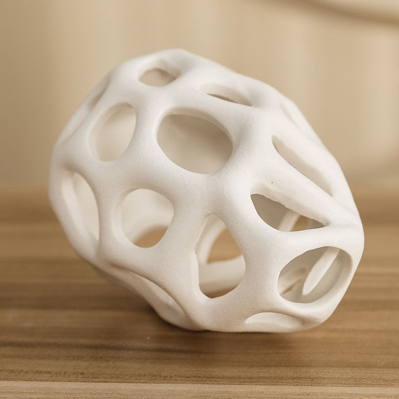 Bottom angle view of white ceramic abstract vase