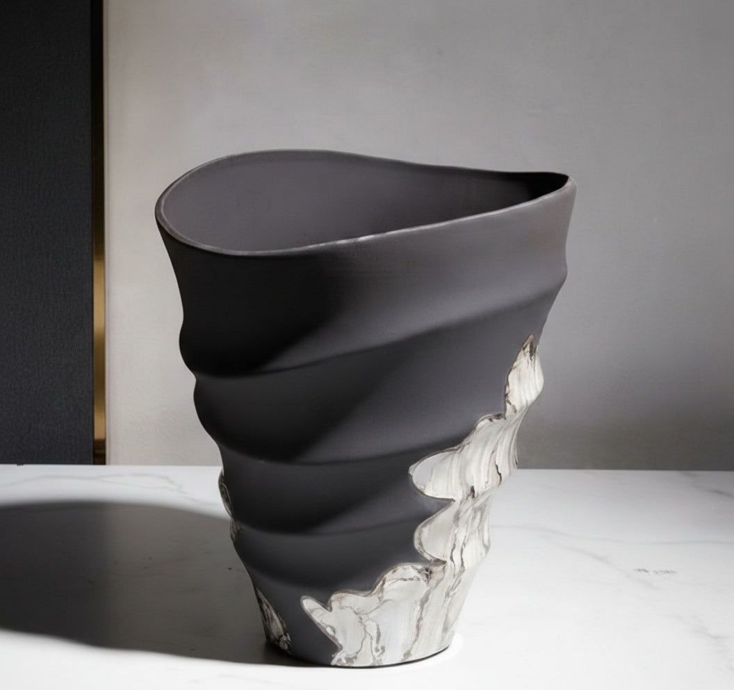 Side view of wavy ceramic vase with dual-tone finish
