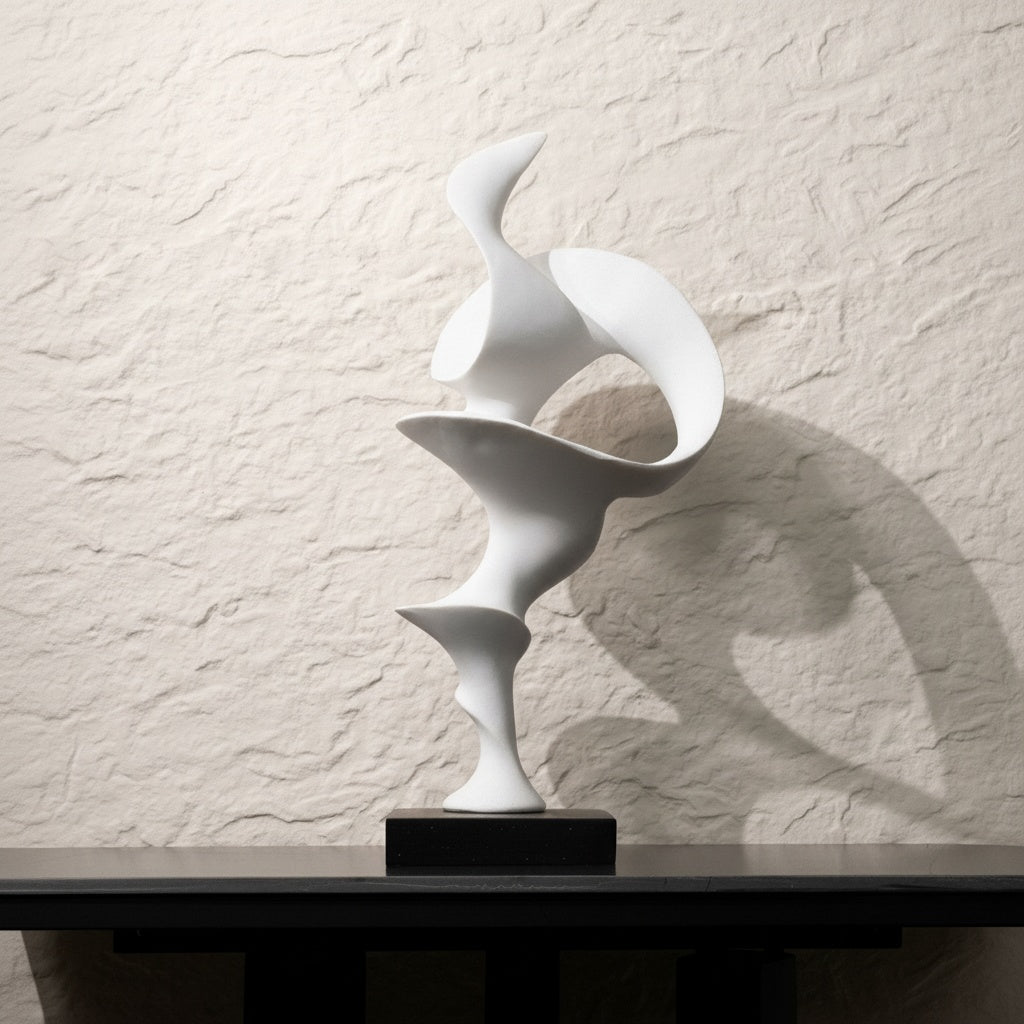 Matte White Abstract Sculpture showing fluid curves and shadows