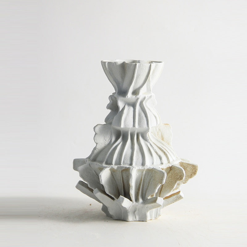 Close up of fluted white ceramic vase texture and rim