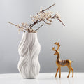 White wave texture vase styled with gold deer ornament
