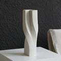 Large sculptural white ceramic vase angled view