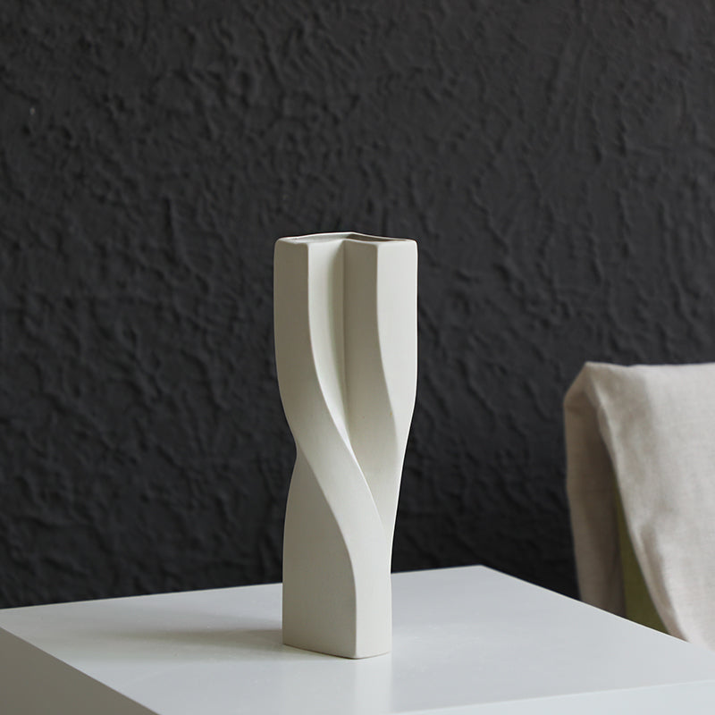 Medium twisted white ceramic vase front view