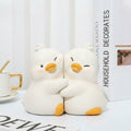 Matte White Resin Duck Bookends Hugging